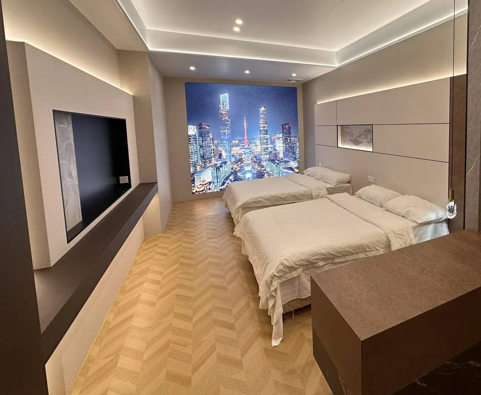 Guest room with printed city-skyline feature wall