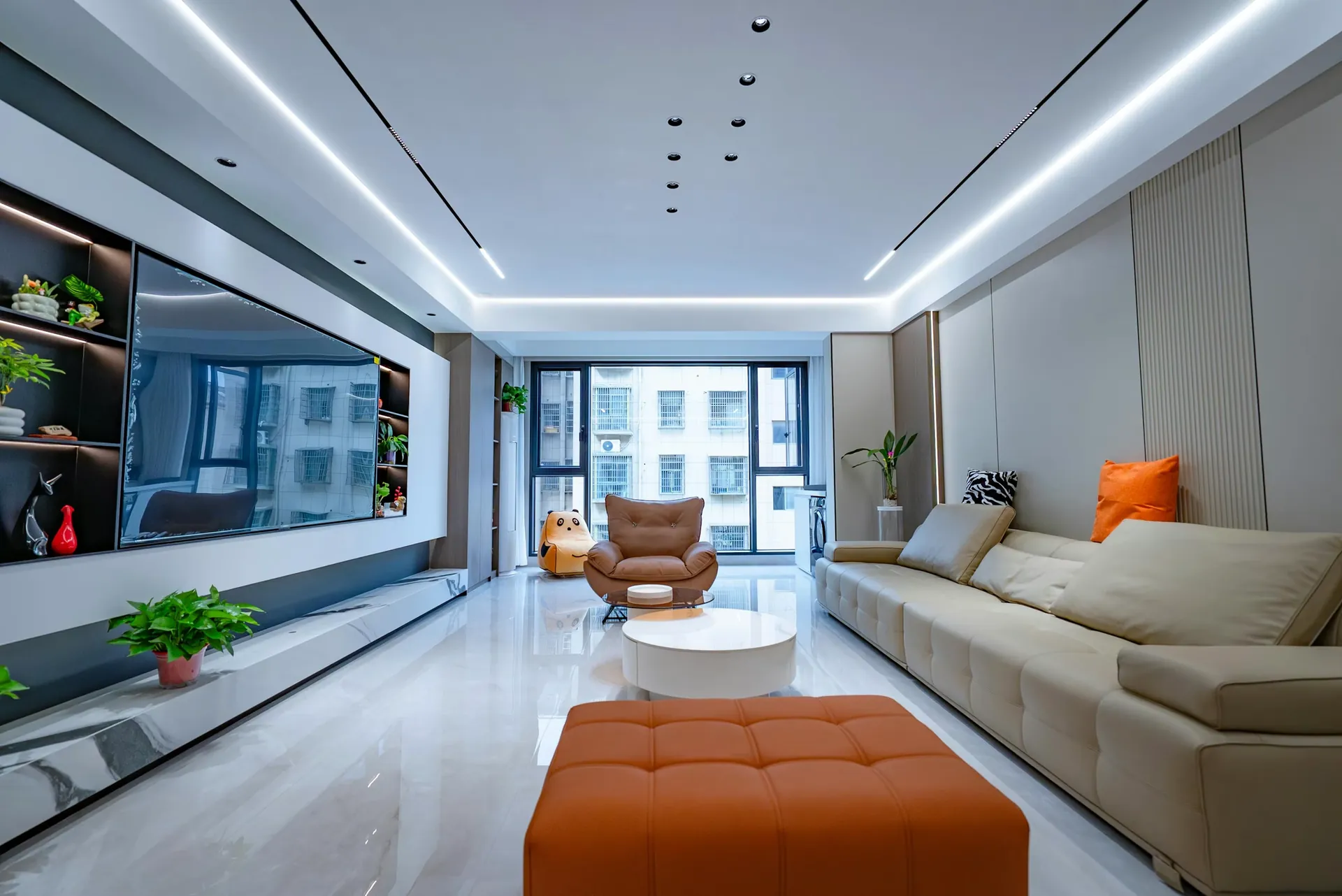 Modern living room with TV feature wall